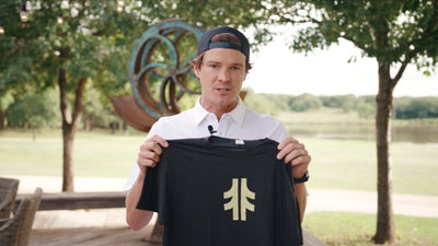 Load and play video in Gallery viewer, Brand Stack Youth Tee - Heather Red / Navy